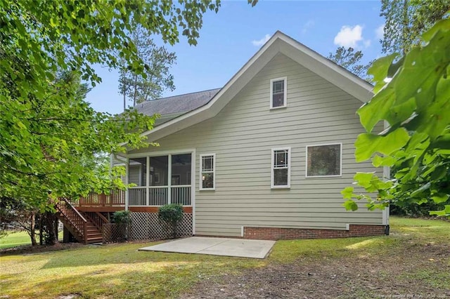 57 Spring Water Ct, Spring Lake, NC 28390 - back of house with a patio area, a sunroom, stairs, and a lawn