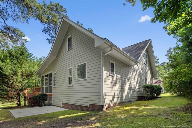 57 Spring Water Ct, Spring Lake, NC 28390 - view of home's exterior featuring a lawn and a patio area