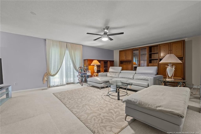 5945 Muscat Rd, Hope Mills, NC 28348 - living room featuring carpet flooring and a ceiling fan