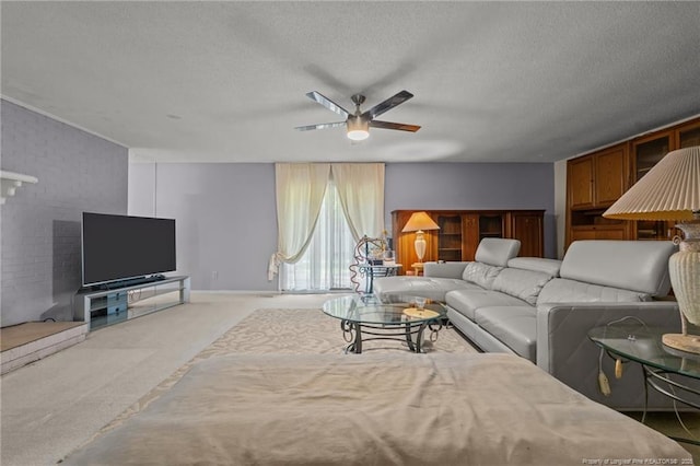 5945 Muscat Rd, Hope Mills, NC 28348 - living room featuring a ceiling fan, a textured ceiling, and carpet