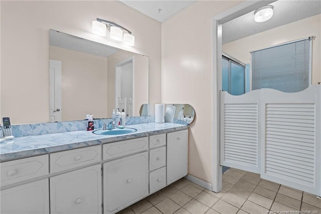 5945 Muscat Rd, Hope Mills, NC 28348 - full bathroom with vanity, tile patterned flooring, and an enclosed shower