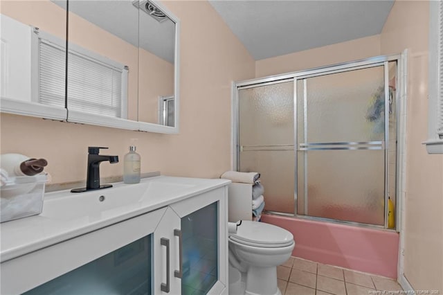 5945 Muscat Rd, Hope Mills, NC 28348 - full bathroom with vanity, tile patterned flooring, and bath / shower combo with glass door