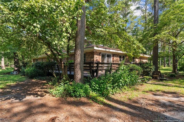 5945 Muscat Rd, Hope Mills, NC 28348 - rear view of house featuring brick siding