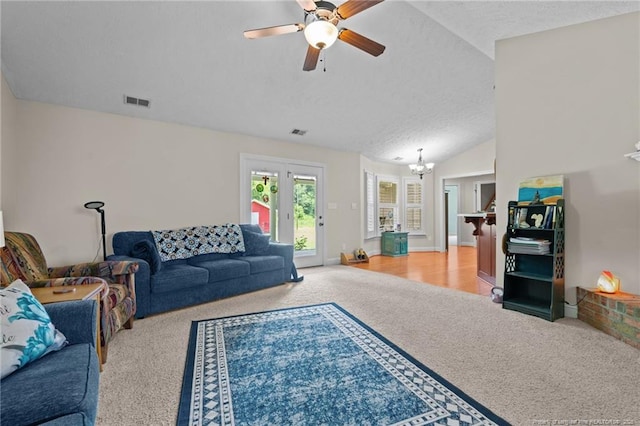 1438 Division Pl, Fayetteville, NC 28312 - living area with carpet flooring, a chandelier, a textured ceiling, ceiling fan, and lofted ceiling
