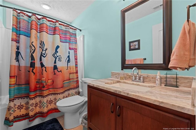 1438 Division Pl, Fayetteville, NC 28312 - full bathroom with vanity, a textured ceiling, tile patterned floors, and shower / bath combo with shower curtain