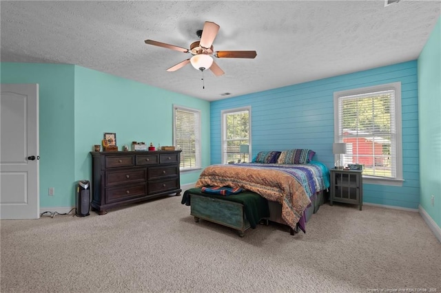 1438 Division Pl, Fayetteville, NC 28312 - carpeted bedroom featuring a textured ceiling and ceiling fan