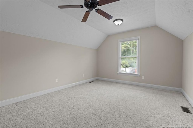 1438 Division Pl, Fayetteville, NC 28312 - bonus room featuring lofted ceiling, carpet floors, a textured ceiling, and a ceiling fan