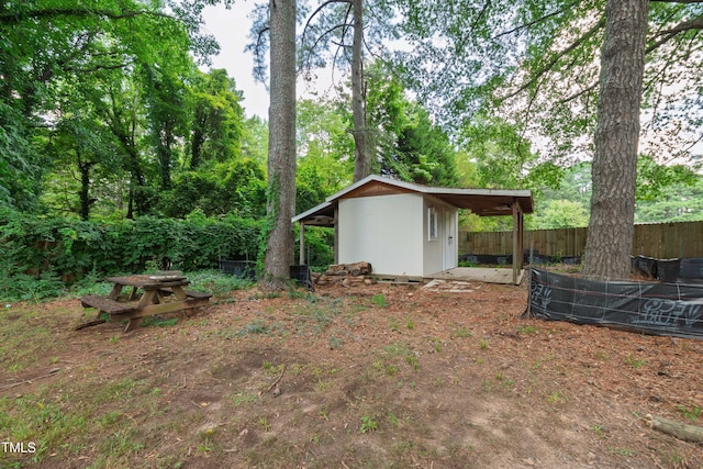 322 Jones Franklin Rd, Raleigh, NC 27606 - view of yard featuring a storage shed