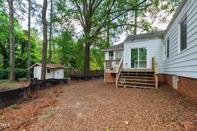 322 Jones Franklin Rd, Raleigh, NC 27606 - view of yard with a shed, a wooden deck, and stairs