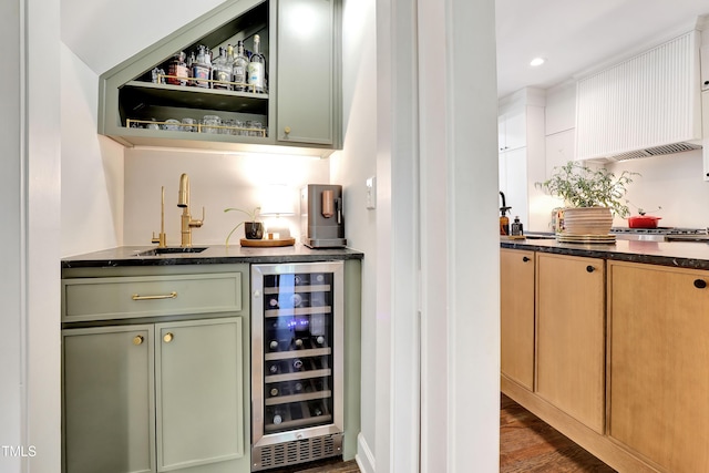 5004 Sunset Forest Cir, Holly Springs, NC 27540 - indoor wet bar featuring wine cooler, recessed lighting, dark wood-style flooring, and stainless steel gas stovetop