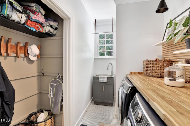 5004 Sunset Forest Cir, Holly Springs, NC 27540 - laundry room with ornamental molding, wet bar, and washer and clothes dryer