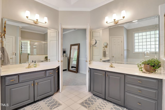 5004 Sunset Forest Cir, Holly Springs, NC 27540 - full bath with crown molding, two vanities, tile patterned flooring, and a stall shower