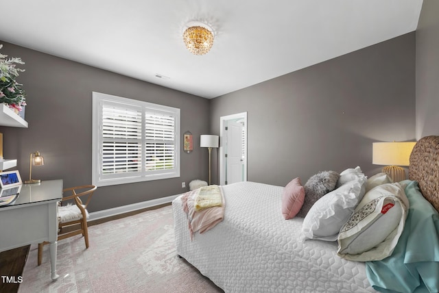 210 Meadow Lake Dr, Youngsville, NC 27596 - bedroom with baseboards and wood finished floors