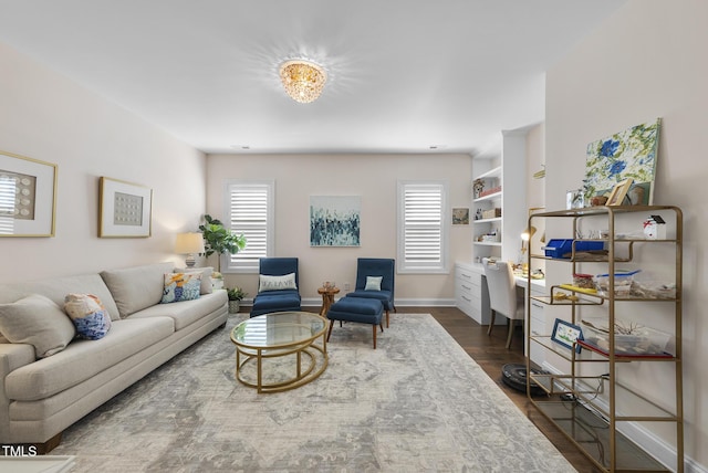 210 Meadow Lake Dr, Youngsville, NC 27596 - living area featuring dark wood-style floors and baseboards