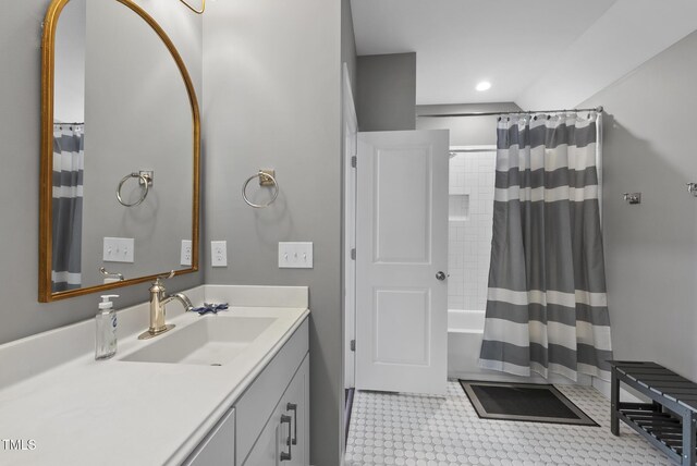 210 Meadow Lake Dr, Youngsville, NC 27596 - full bath featuring vanity, tile patterned floors, and shower / bath combination with curtain