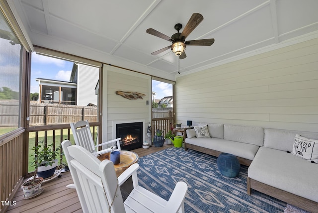 210 Meadow Lake Dr, Youngsville, NC 27596 - sunroom with an outdoor living space with a fireplace and ceiling fan