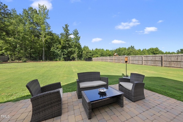 210 Meadow Lake Dr, Youngsville, NC 27596 - fenced backyard with a patio