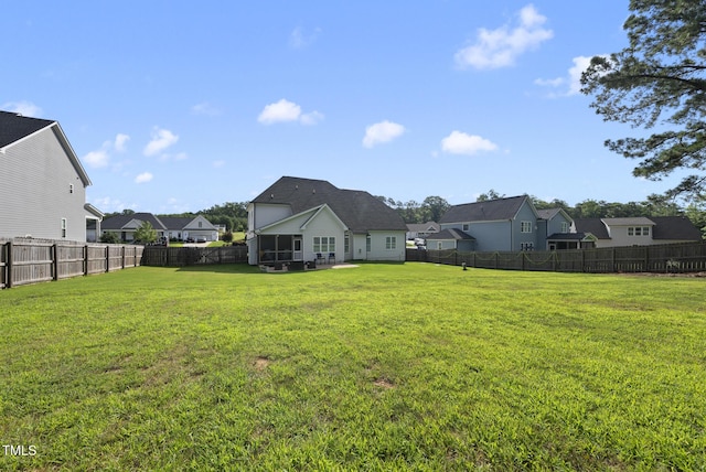 210 Meadow Lake Dr, Youngsville, NC 27596 - fenced backyard featuring a residential view and a sunroom