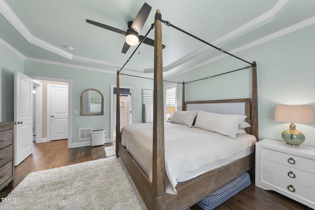 210 Meadow Lake Dr, Youngsville, NC 27596 - bedroom featuring crown molding, dark wood-style floors, and ceiling fan