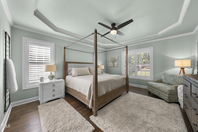 210 Meadow Lake Dr, Youngsville, NC 27596 - bedroom featuring dark wood-style floors, a raised ceiling, ornamental molding, and ceiling fan