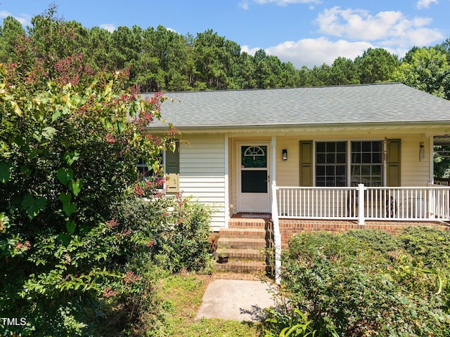 270 Ballard Pruitt Rd, Franklinton, NC 27525 - view of front of home with a porch and roof with shingles