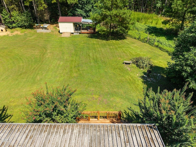 270 Ballard Pruitt Rd, Franklinton, NC 27525 - view of green lawn with a shed and a deck