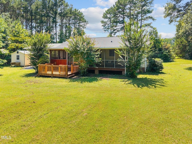 270 Ballard Pruitt Rd, Franklinton, NC 27525 - back of property with a sunroom, a lawn, and a deck