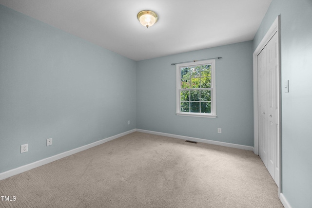 270 Ballard Pruitt Rd, Franklinton, NC 27525 - unfurnished bedroom featuring carpet and a closet