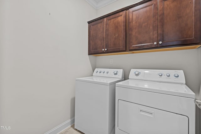 113 Canary Ct, Raleigh, NC 27610 - washroom with washer and dryer, cabinet space, and ornamental molding