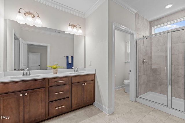 113 Canary Ct, Raleigh, NC 27610 - bathroom featuring double vanity, a shower stall, ornamental molding, and tile patterned floors