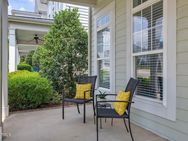 7712 Acc Blvd, Raleigh, NC 27617 - covered porch featuring a ceiling fan