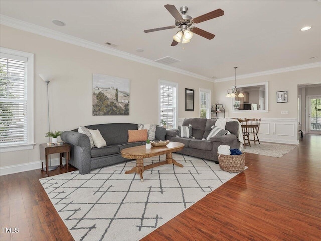 7712 Acc Blvd, Raleigh, NC 27617 - living area featuring light wood-type flooring, ceiling fan, and crown molding