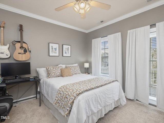 7712 Acc Blvd, Raleigh, NC 27617 - carpeted bedroom featuring ornamental molding and a ceiling fan