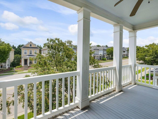 7712 Acc Blvd, Raleigh, NC 27617 - wooden porch featuring ceiling fan and a residential view