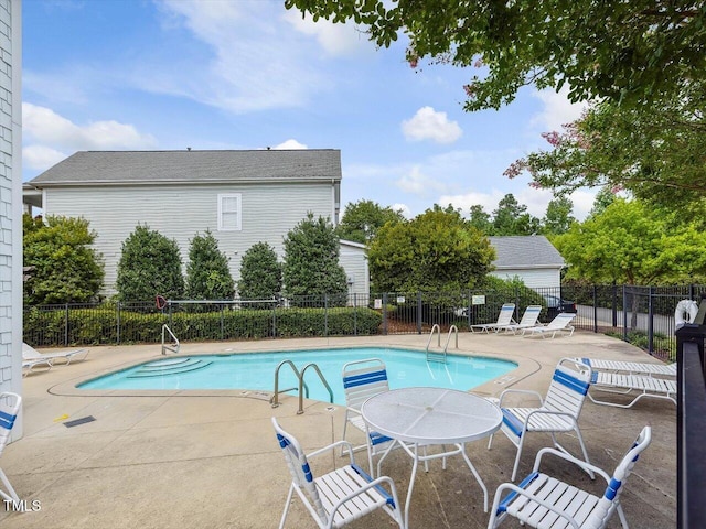 7712 Acc Blvd, Raleigh, NC 27617 - community pool with a patio