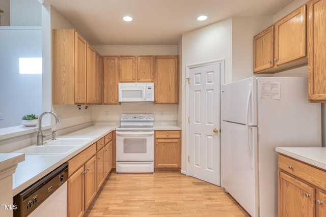 2304 Folger St, Raleigh, NC 27604 - kitchen featuring white appliances, light wood-style flooring, light countertops, and recessed lighting