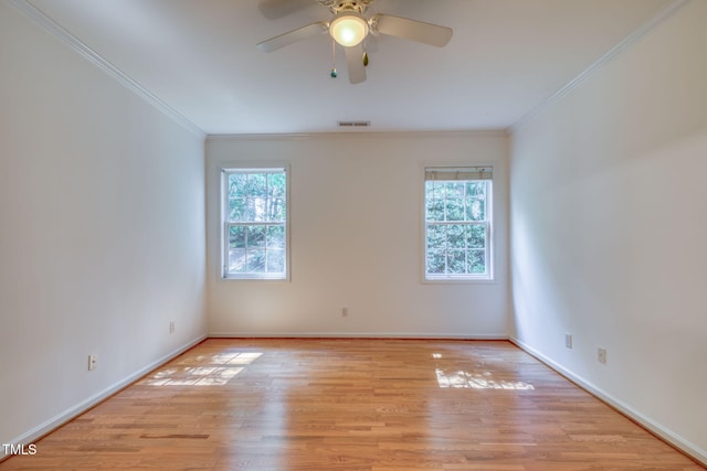 2304 Folger St, Raleigh, NC 27604 - unfurnished room with ornamental molding, light wood-style flooring, and ceiling fan