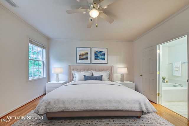 2304 Folger St, Raleigh, NC 27604 - bedroom featuring crown molding, light wood-type flooring, connected bathroom, and a ceiling fan