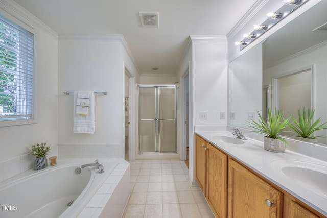 2304 Folger St, Raleigh, NC 27604 - bathroom with a shower stall, double vanity, a bath, crown molding, and tile patterned floors