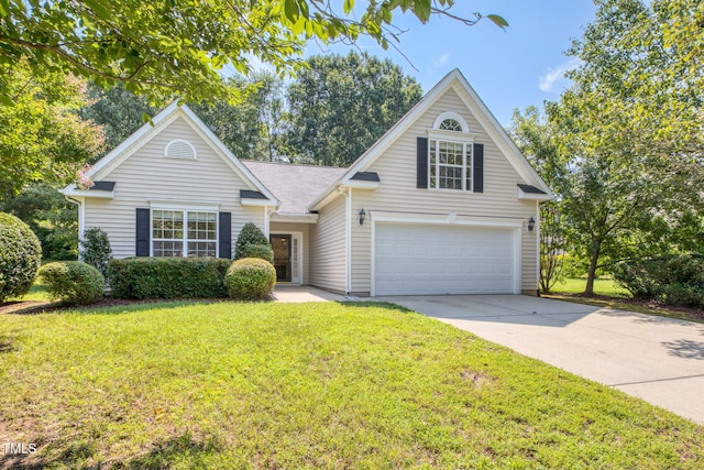 2304 Folger St, Raleigh, NC 27604 - traditional-style home featuring driveway, an attached garage, and a front lawn