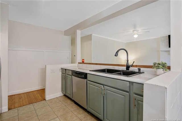 1828 Notre Dame Pl, Fayetteville, NC 28304 - kitchen featuring dishwasher, light countertops, light tile patterned floors, and a ceiling fan