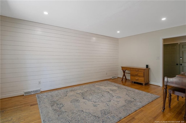 1828 Notre Dame Pl, Fayetteville, NC 28304 - interior space featuring light wood-style flooring, recessed lighting, and wood walls