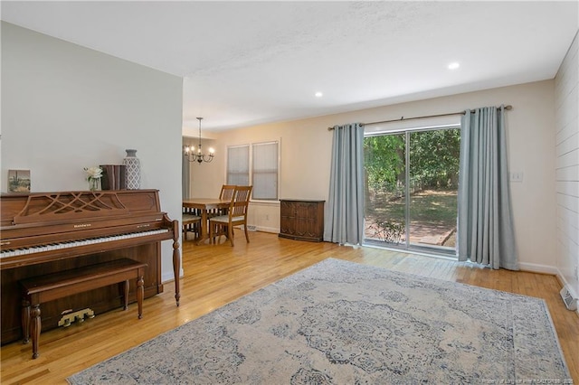 1828 Notre Dame Pl, Fayetteville, NC 28304 - living area with a chandelier, wood finished floors, and recessed lighting