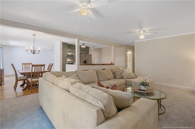 1828 Notre Dame Pl, Fayetteville, NC 28304 - living area with ceiling fan, light carpet, and a chandelier