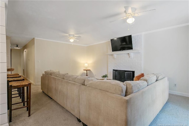 1828 Notre Dame Pl, Fayetteville, NC 28304 - living room with ceiling fan, light colored carpet, a fireplace, and ornamental molding