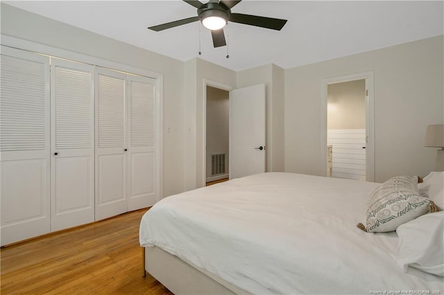 1828 Notre Dame Pl, Fayetteville, NC 28304 - bedroom featuring light wood-style flooring, ceiling fan, and a closet