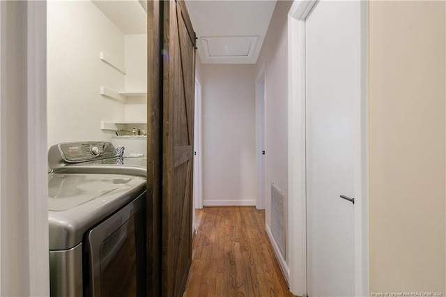 1828 Notre Dame Pl, Fayetteville, NC 28304 - laundry room featuring separate washer and dryer and wood finished floors
