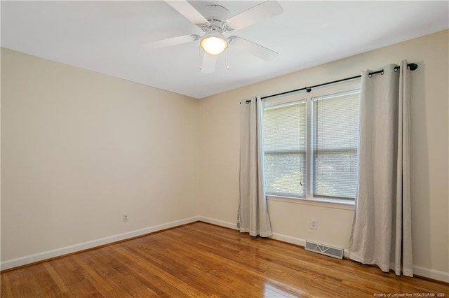 1828 Notre Dame Pl, Fayetteville, NC 28304 - unfurnished room featuring light wood-style flooring and a ceiling fan