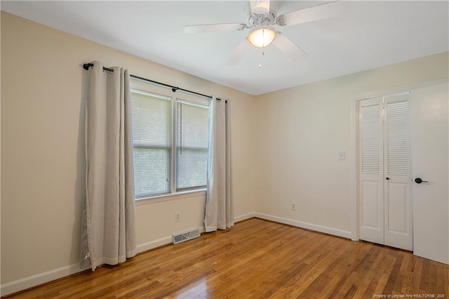 1828 Notre Dame Pl, Fayetteville, NC 28304 - unfurnished bedroom with wood finished floors and a ceiling fan