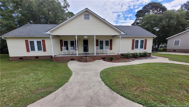 2508 N Roberts Ave N, Lumberton, NC 28358 - ranch-style home with crawl space, a front yard, covered porch, and french doors